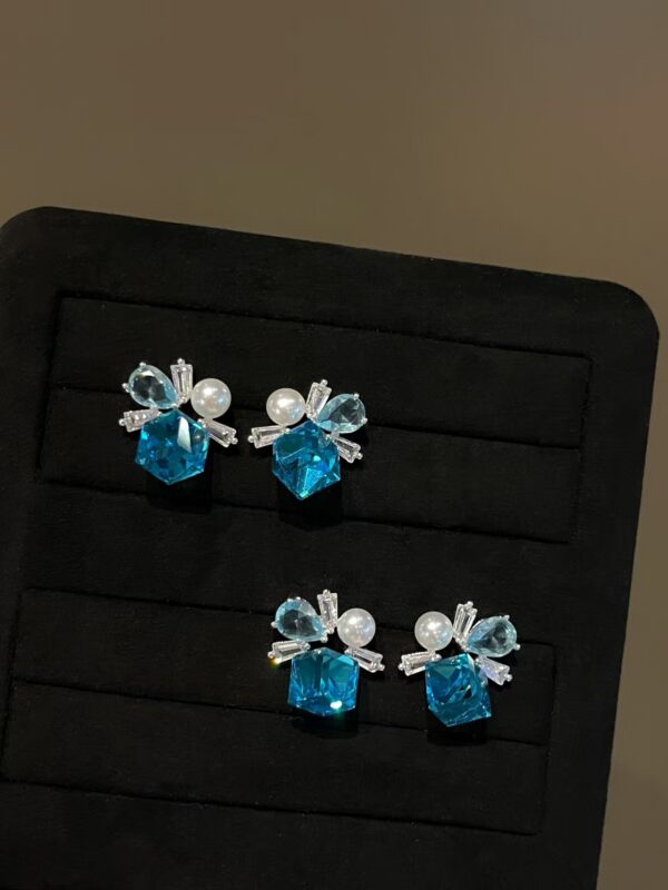 ee8d5d2555aa4ebc41656738ac5d2ca5 Blue Ocean Crystal Adorned with 6mm Freshwater Pearl